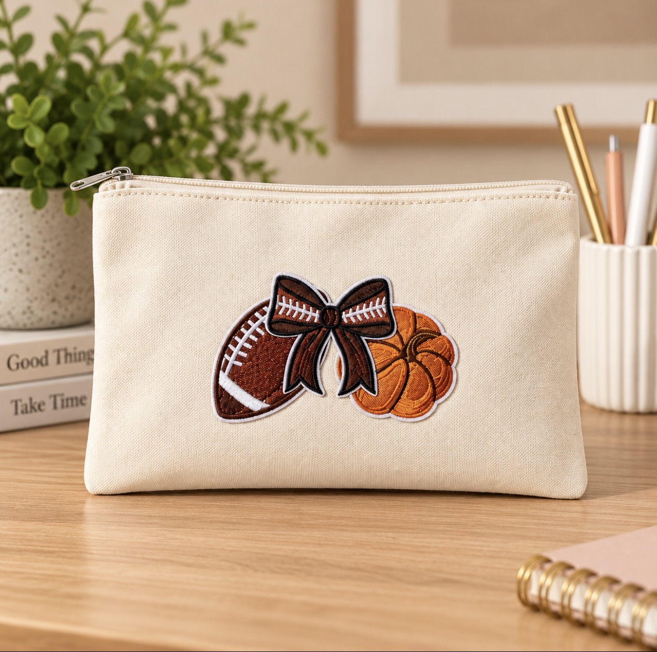 Cream zipper pouch with football, bow and pumpkin patches